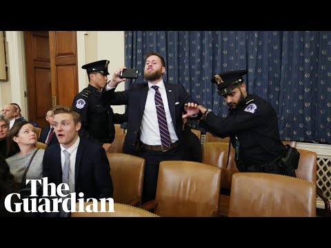 'Democrat treason': protester disrupts opening of Trump impeachment hearing