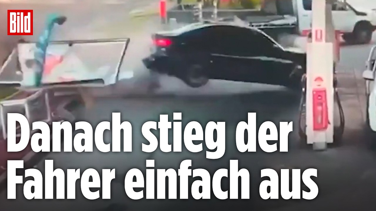 SYDNEY: BMW schleudert in Tankstelle und verfehlt knapp einen Passanten
