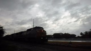 preview picture of video 'CSX Train Passes Through Crossing On A Stormy Day'
