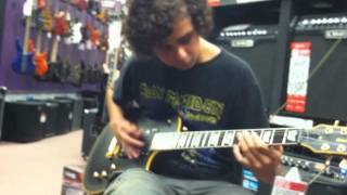 Kyle DiPietro jams a $4,000  guitar at guitar center