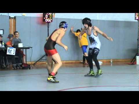 Christian Correa from New Milford wrestling Jalaa Darwish from Pascack Hills.