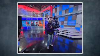 WFAA senior director Aaron Butler celebrates his last broadcast