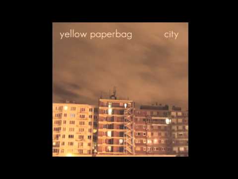 yellow paperbag - city
