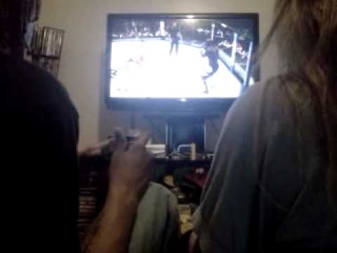 Tax G gets beat by one of his hoes in UFC wow smh