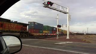 preview picture of video 'BNSF Stack Train Roars through Amboy, CA...Round 2'