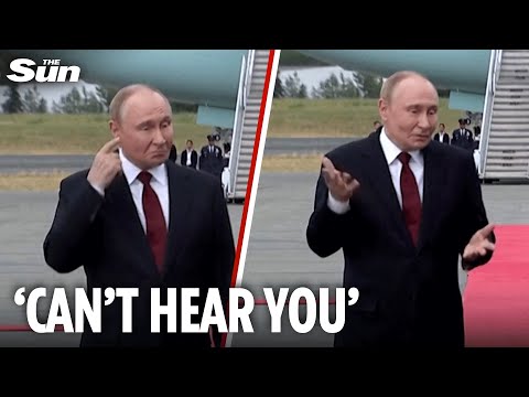 Shock moment Putin pretends not to hear as he's asked if he'll stop killing civilians