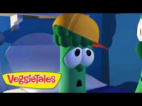 Green veggie character from VeggieTales wearing a yellow hard hat, looking surprised in a blue scene.
