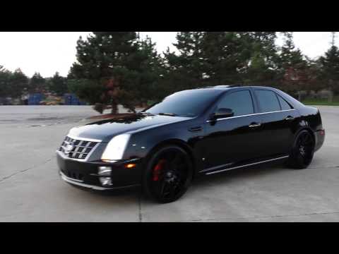 cadillac sts staggered with floating center caps blacked out