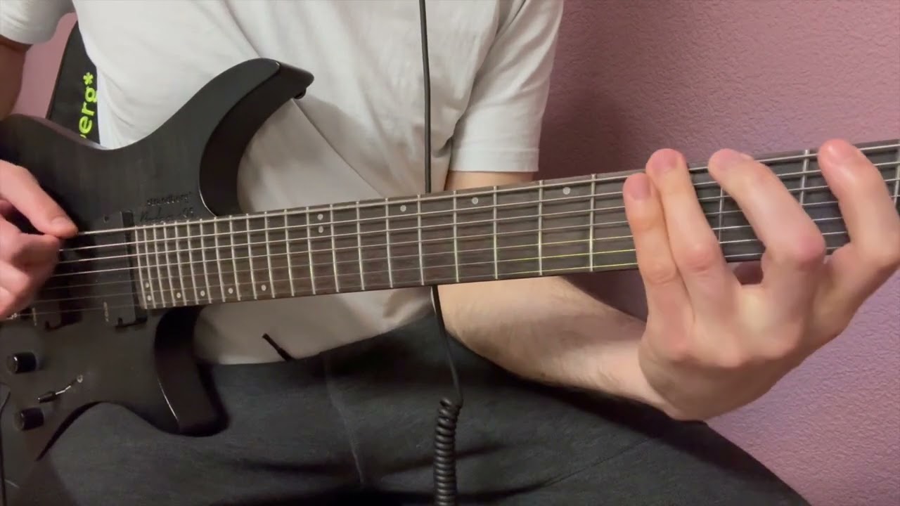Guitarist playing the low seven-string djent riff of Meshuggah's In Death Is Death