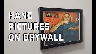 Hanging Pictures Without Drilling Holes (How to Hang Pictures on Drywall/ EZ Anchors)