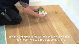 Applying maintenace oil to wood floor