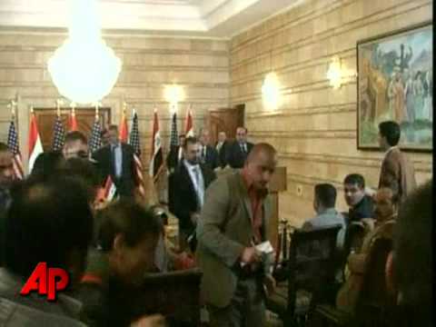 Raw Video: Iraqi Journalist Throws Shoe at Bush