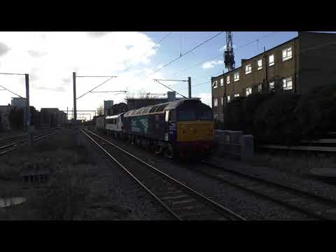 (HD) DRS 57002 + Greater Anglia 90002 & DBSO 9707 pass Caledonian Road & Barnsbury 15/2/18