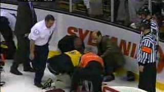 Patrice Bergeron gets taken out by Randy Jones