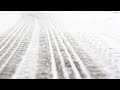 Snow Showers Will Stick Around Through Tonight