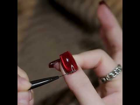 Crystal cat eye gel polish nail art design with red jelly gel polish