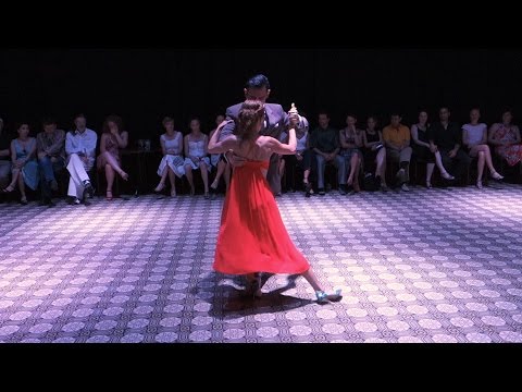  Eugenia Ramírez Miori  and  Demián García  are  dancing  to  the  tango  "  Entrador  "  by  Osvaldo Pugliese  in  2015