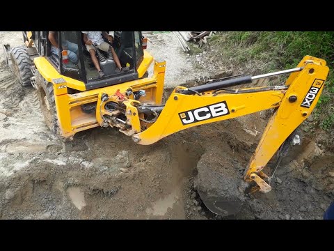 JCB Backhoe Working For New Bridge Construction