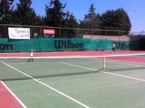Rafael Pagonis playing tennis at age 3,5