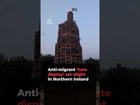 Anti-migrant display set alight in Northern Ireland bonfire