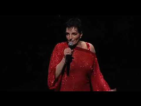 Press still: Minnelli center, four-man vocal line fanned behind, big-band hits landing