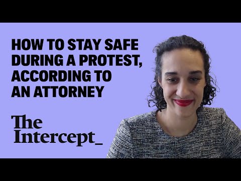 How To Stay Safe At a Protest, According To An Attorney