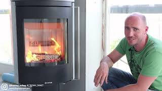 Печь в доме у озера. Дымоход Craft. Особенности и устройство печи-камина Color D16