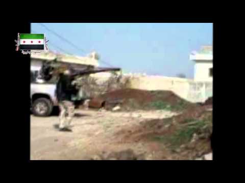 التصدي لقوات النظام التي تحاول التقدم على تل غرين في ريف درعا من قبل لواء توحيد الأمة