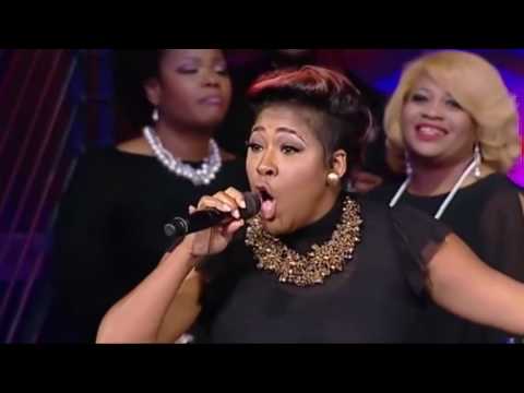 Candy West snaps during worship at Potter's House Dallas