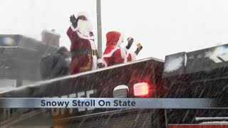 Snowy Stroll on State brings smaller crowd to downtown Rockford event
