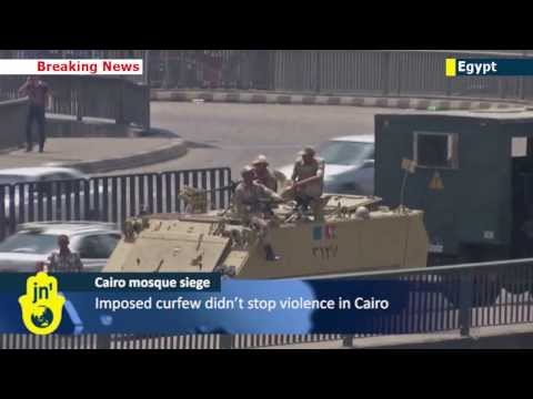 Cairo Mosque Siege: Egyptian army escorts a small group of Islamist protesters from Cairo mosque