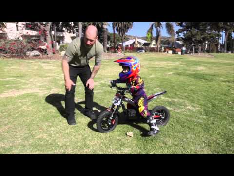 Kid Riding Oset 12.5 Electric Trials Bike