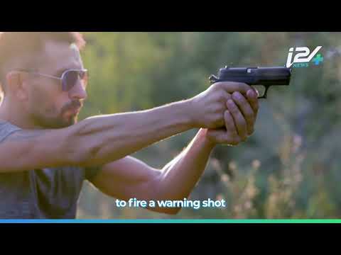 Does everyone in Israel carry a weapon?