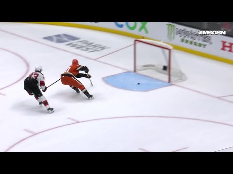 Chris Kreider scores a goal against the New Jersey Devils
