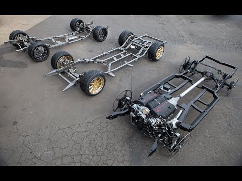 3 rolling chassis at MetalWorks Classic Auto & Speed Shop including Art Morrison & Roadster Shop