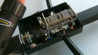 Remote control for a motor tuned magnetic loop antenna.