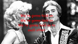 We're gonna hold on George Jones and Tammy Wynette with Lyrics