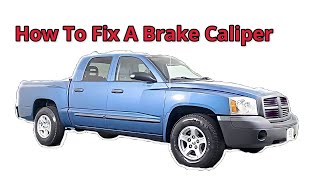 How To Remove And Fix A Bad Brake Caliper On A 2006 Dodge Dakota 4.7 Engine 4WD #dodge