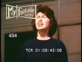 1960s Mom Chases Son In Galoshes