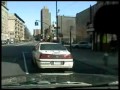 Jimmy Justice - An NYPD officer uses a squad car.