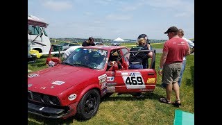 Becky Pratt racing 24 Hours of LeMons NJMP in the DTM BMW E30