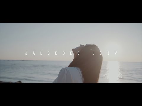 Kenneth Rüütli feat. Maia Vahtramäe - Jälgedes liiv (Official video)