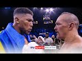 Anthony Joshua confronts Oleksandr Usyk after defeat & throws belts out of the ring