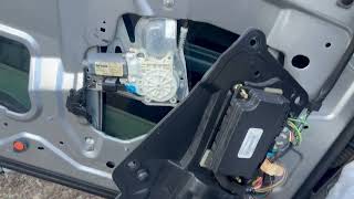 2005 Cadillac Deville replacing driver window regulator
