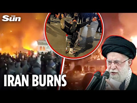 Armed Iranians BURN buildings and RAID mosques - supreme leader says it's all just to 'please Trump'