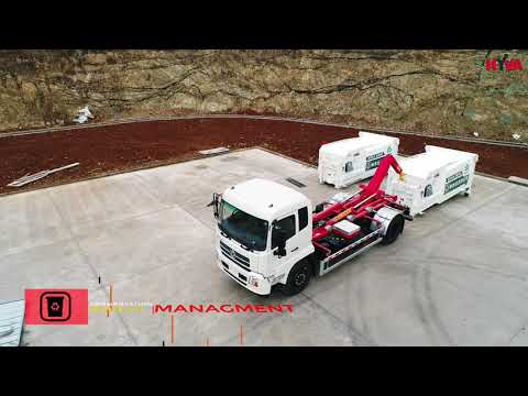 Hyva Titan EVO hookloader at work in China - transport of the containers