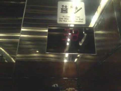 SUPER FAST Otis Elevonic 411 Traction High Rise elevators at the Millenium Hilton, NYC