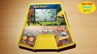 CASIO Guerrilla Warfare BUH KOOM!! LCD game /1987/Japan