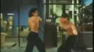 Peculiar fight scene circa 85 w/ music by lips and ribs