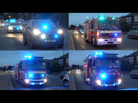 Three Pump Police And Fire Convoy Responding To Bomb Threat In Manchester